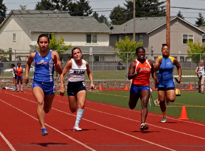 Auburn Mountainview senior Erika Lombardo runs the anchor leg for the Lions' 400-meter relay team. Auburn Mountainview finished first with a 49.29 second time.