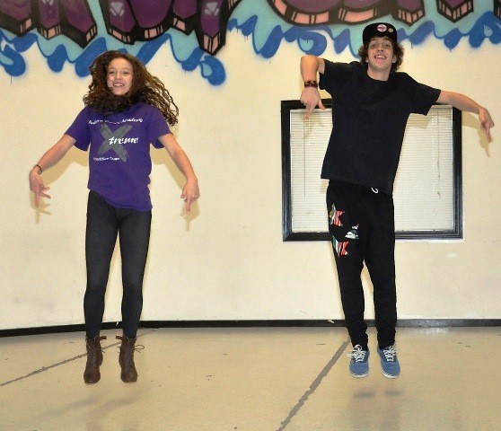 Starley and Chris Carrington practice their dance for Uniquely Auburn at the Auburn Dance Academy.