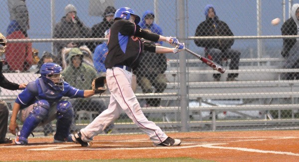 Senior Shawn Guinn smacks a double for the Auburn Mountainview Lions.