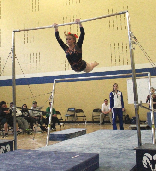 Auburn Mountainview's Sara Fiksdal on the bars at the West Central District III/Southwest District tourney.