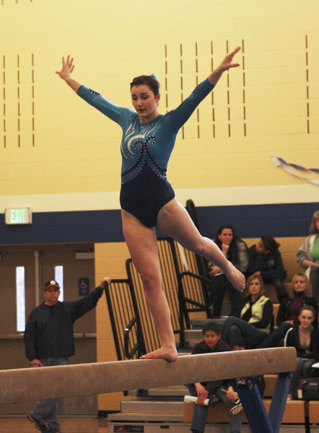 Auburn Riverside's Kylee Smith qualified for regionals on the beam.