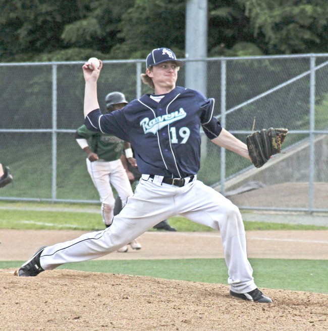 Auburn Riverside junior pitcher Tyler Sherwin pitches during the Ravens 8-5 win over Evergreen.