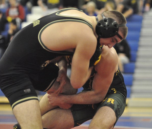 Auburn's James West on his way to pin of Kentridge's Zach Seibel in the 182-pound title match at this past weekend's subdistrict meet.