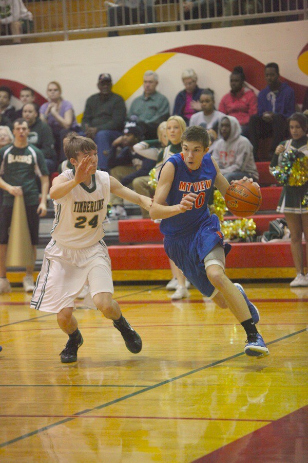 Aarun Rumbaugh in action against Timberline.