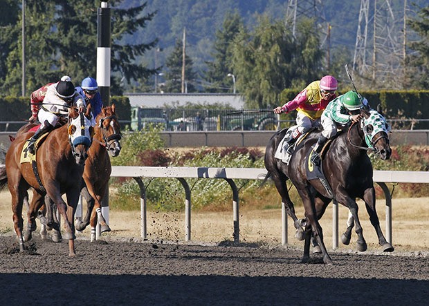 Tribal Waters and Leslie Mawing draw clear in Saturday's feature race at Emerald Downs.