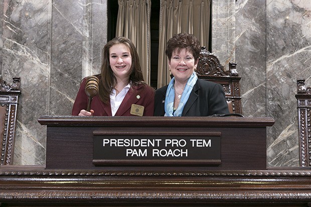 Natalie Eldridge joins Sen. Pam Roach (R-Auburn) on the Senate floor.