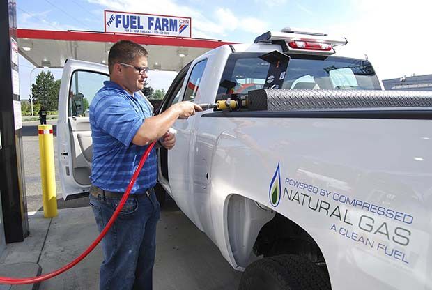 City Street Supervisor Keaka Frank fills up a City rig with compressed natural gas.