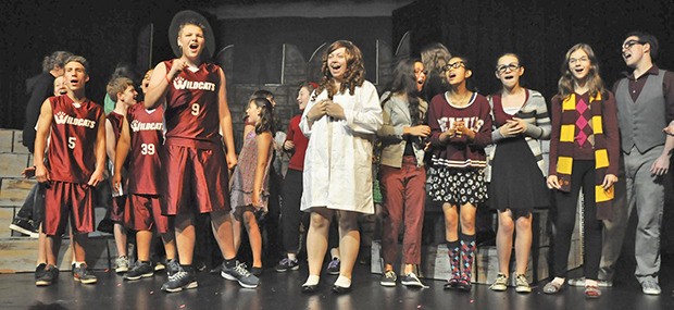 The cast for Disney's 'High School Musical' rehearses this week on stage at the Auburn Ave Theater