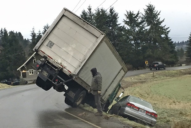 Icy roads made navigating a turn for this truck on Green Valley Road adventurous early Monday morning. There were no injuries.