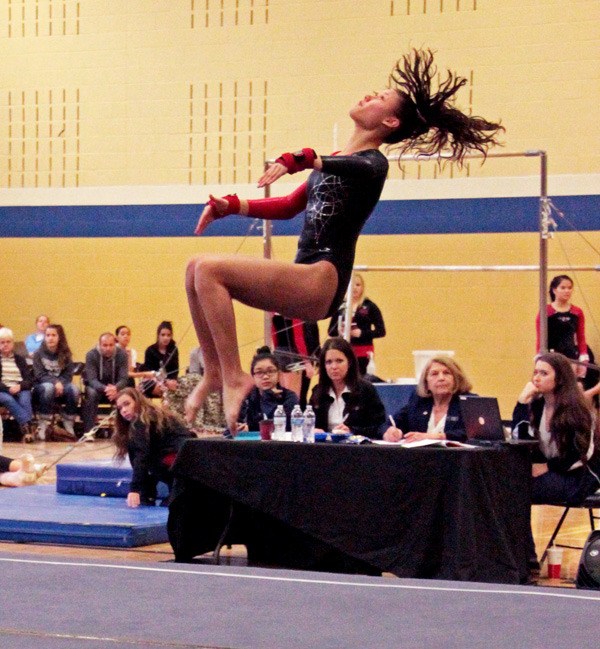 Kentlake's Avalyne Peters competes in the floor exercise.