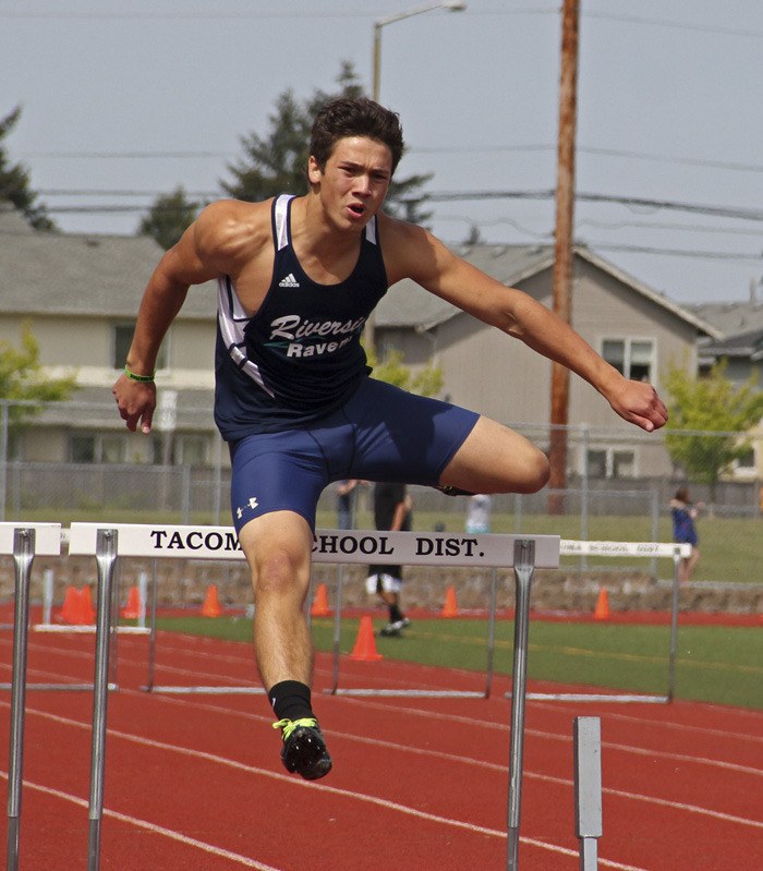 Auburn Riverside senior Andrey Zadneprovskiy qualifies for the state 4A meet in the 300=meter hurdles.