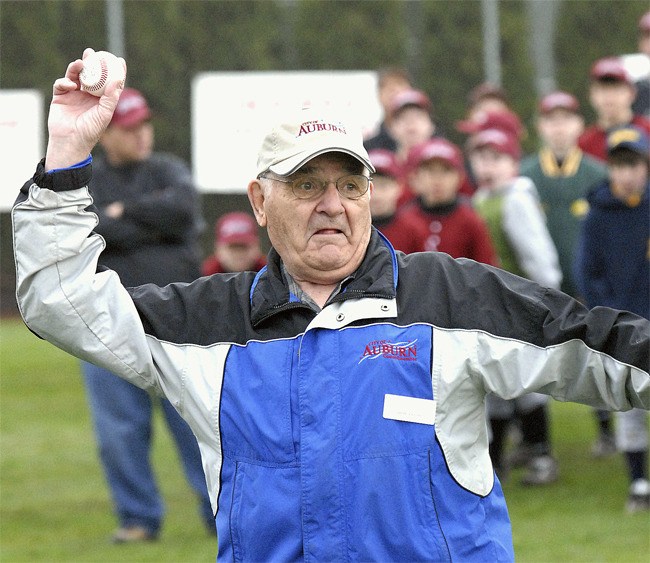 Auburn wrestling coaching legend and former city councilman Gene Cerino throws out the first pitch during the opening ceremonies for the 2008 Little League season.