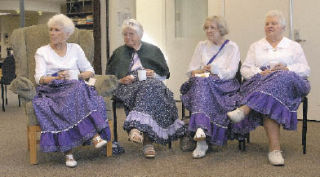 Reminiscing about the good old days of Auburn are the Pioneer Queen and her princesses. From the left are Phyllis Migota