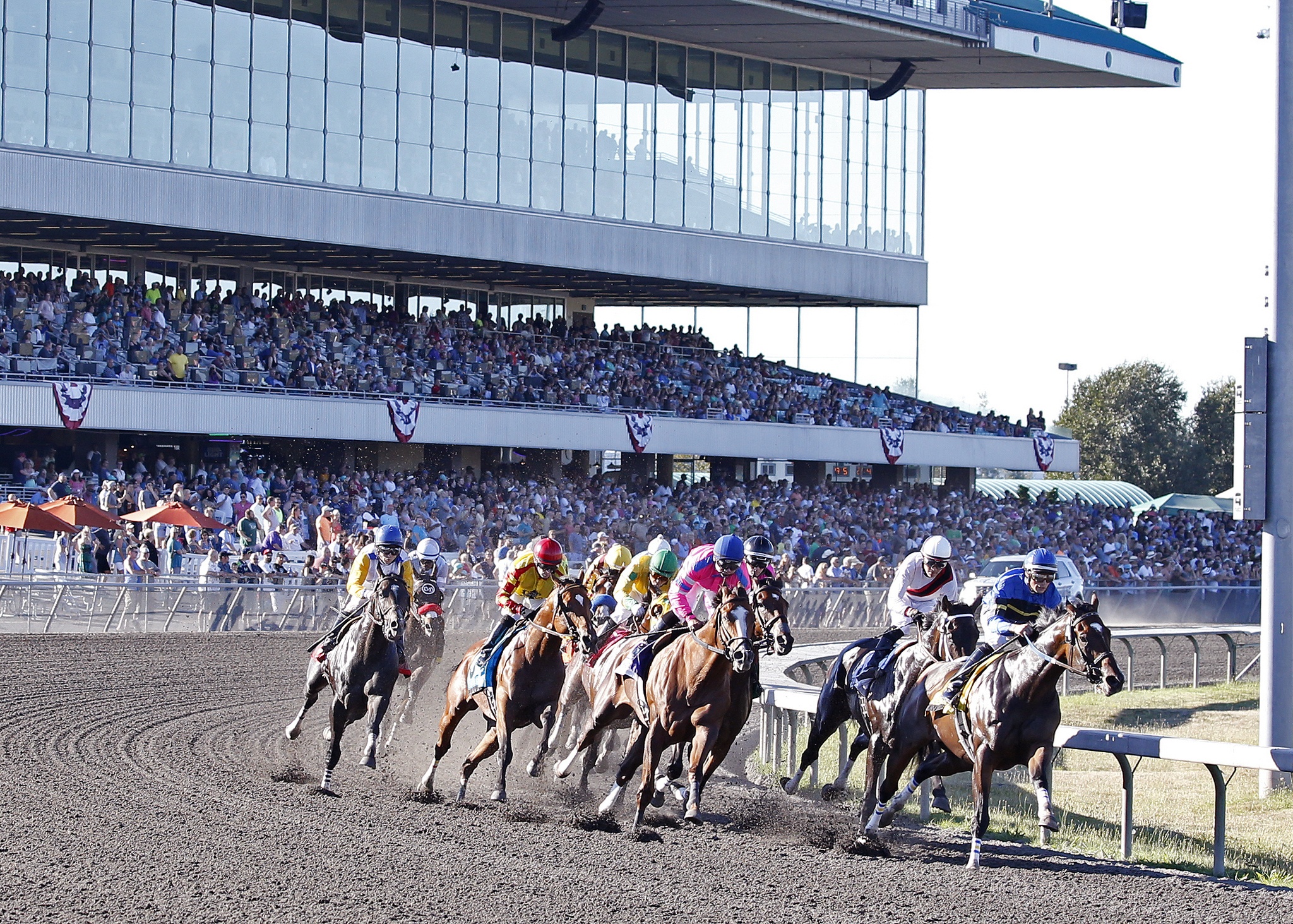 O B Harbor leads the 11-horse field around the clubhouse turn in the $200