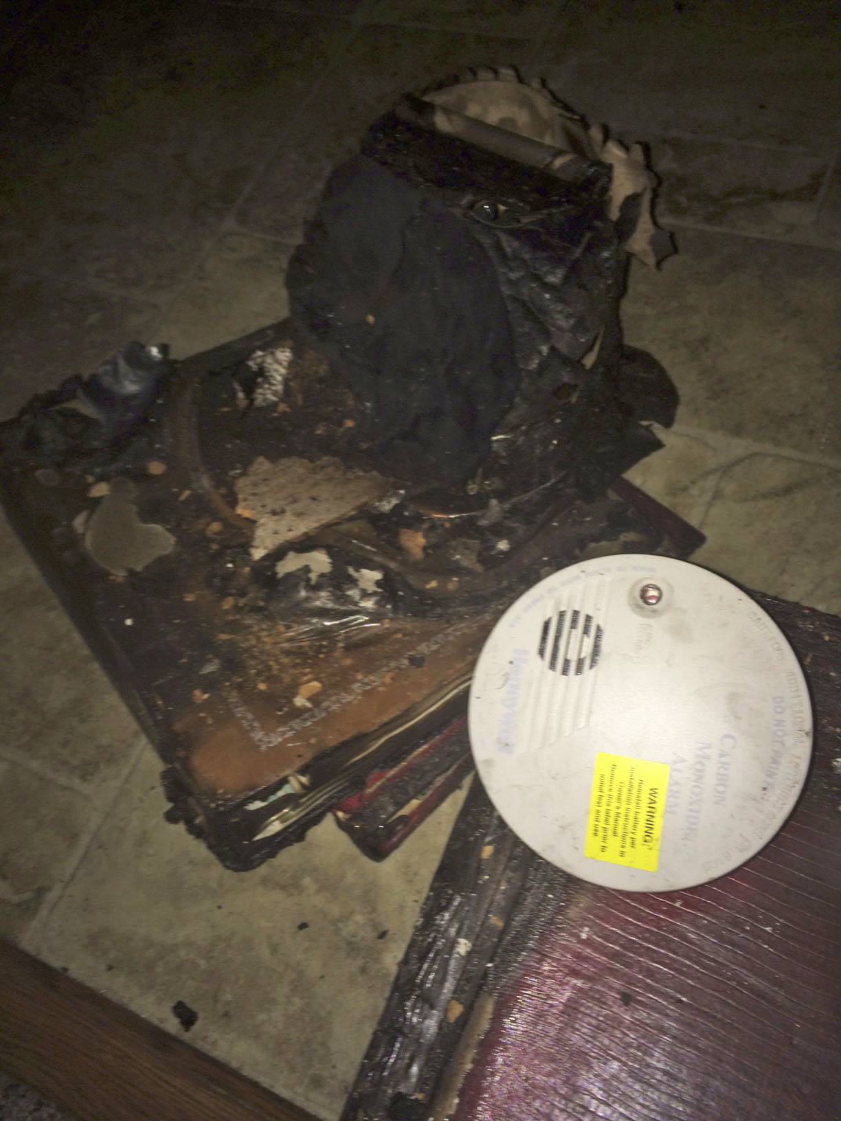 A carbon monoxide alarm survived the fire