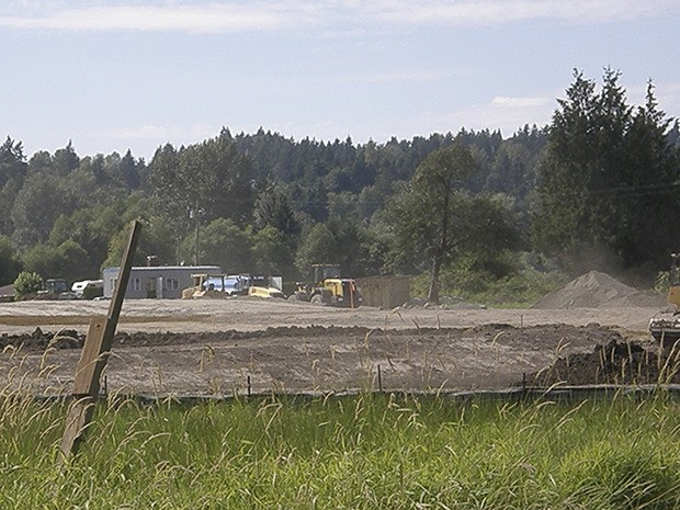 Poe Construction of Auburn is building a warehouse distribution center along West Valley Highway for the property's new owner