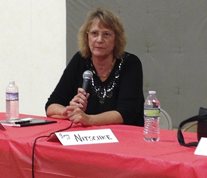 Pacific Mayor Leanne Guier addresses the gathering at the Oct. 15 community forum. Guier is seeking a second term in office. CHRIS CHANCELLOR