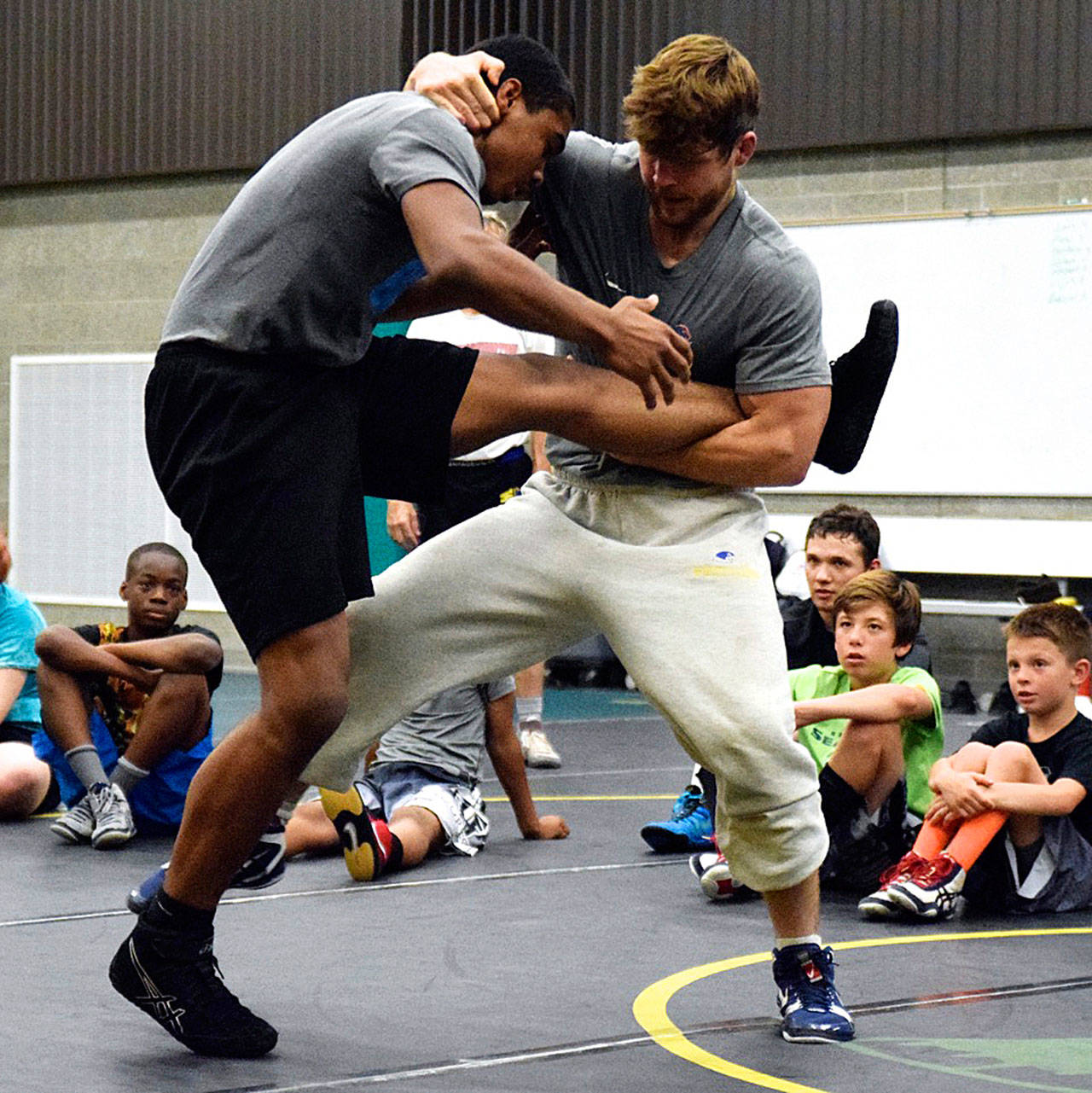 Leg up: Elite instructors teach kids the right moves at wrestling camp