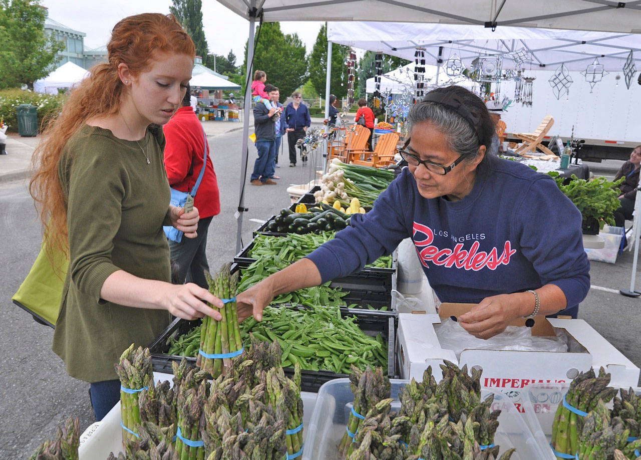 The Auburn International Farmers Market opens for its 11th season on Sunday, offering fresh locally grown farm-based foods. RACHEL CIAMPI, Auburn Reporter