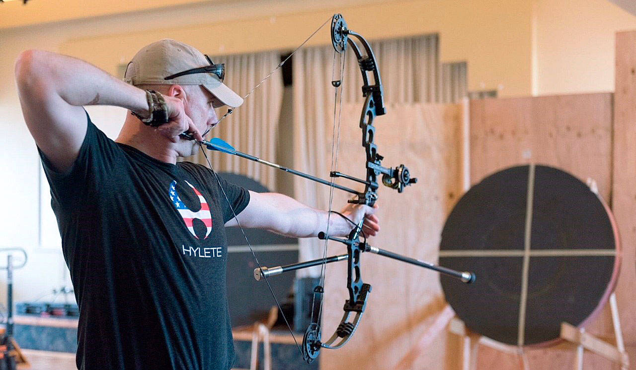 U.S. Navy Nurse Corps Officer, Lt. Carl Hill, a 1994 graduate of Auburn High School, practices his marksmanship for the upcoming Department of Defense Warrior Games. COURTESY PHOTO