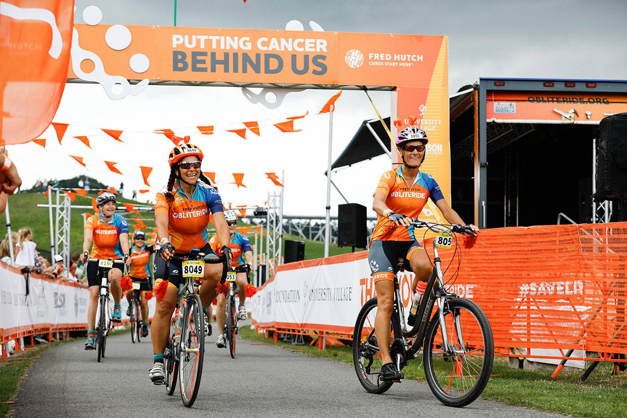 Fred Hutch Obliteride riders reach the finish line during last year’s event. The ride returns to the area Aug. 11. COURTESY PHOTO