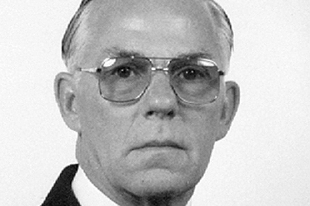 JOHN E. YAW