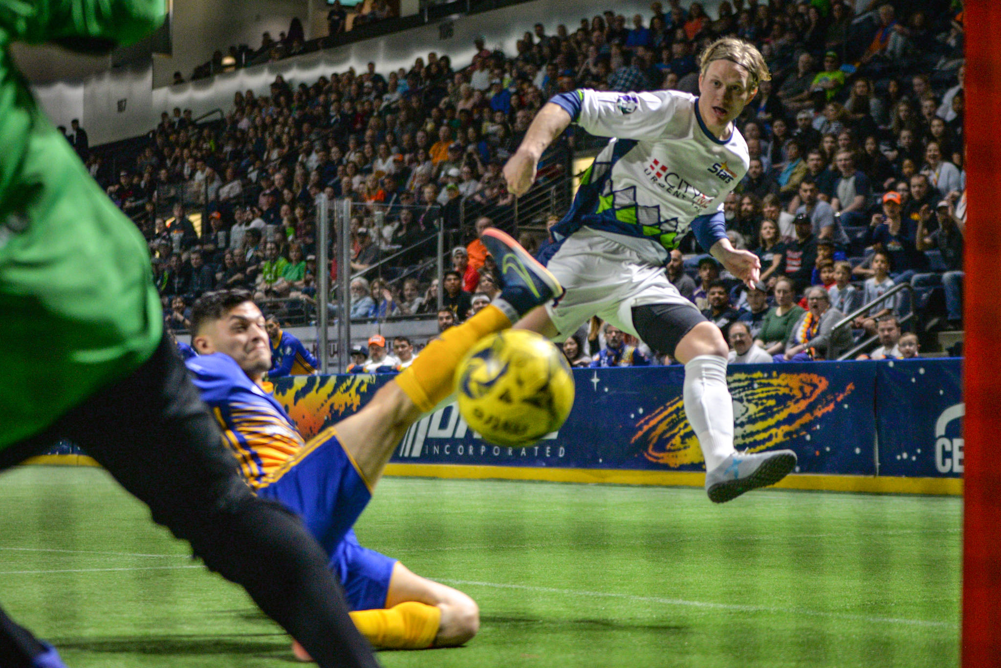 The Stars’ Philip Lund and a Sockers player pursue the ball during MASL action Sunday. COURTESY PHOTO, Stars