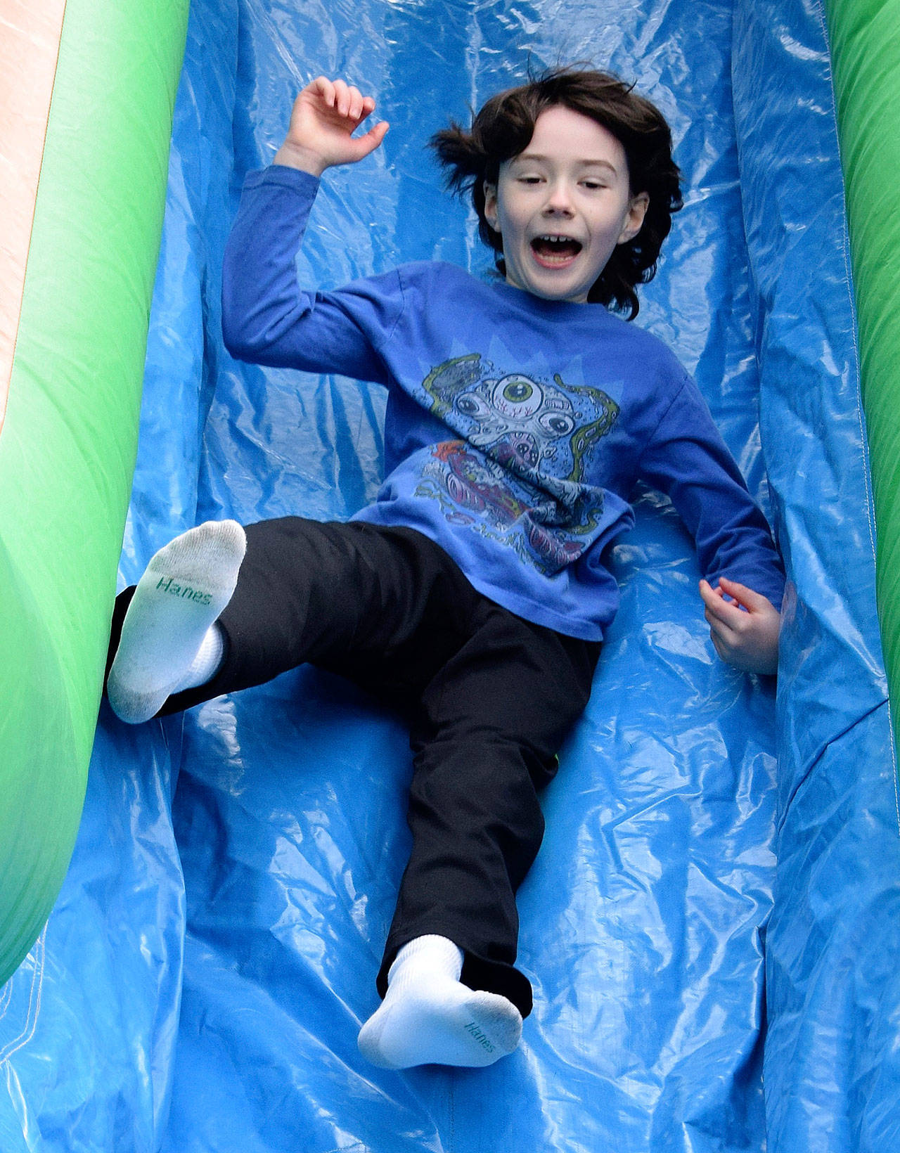 Gabriel Hall enjoys the inflatable slide at Healthy Kids Day at the Auburn Valley Y last year. RACHEL CIAMPI, Auburn Reporter