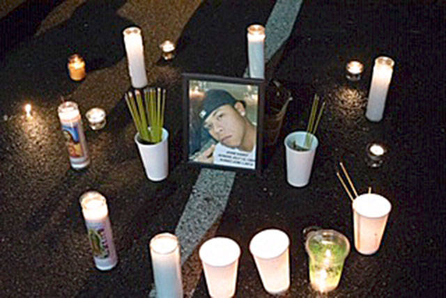 A recent candlelight vigil honors the memory of young man, Jesse Sarey, killed in a police shooting. COURTESY PHOTO, Violet Trushkov