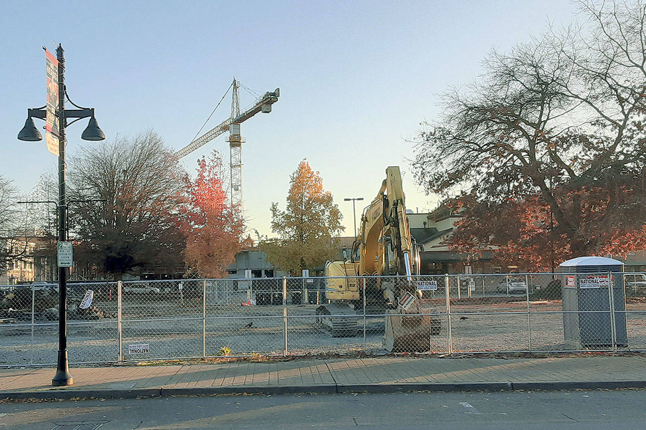 Future developer of block south of City Hall cleaning up dirty soil