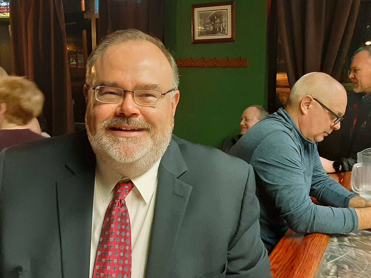 Auburn School District Superintendent Alan Spicciati is all smiles after getting the good news about the district’s two replacement levies Monday night at Oddfellas Pub & Eatery in downtown Auburn. ROBERT WHALE, Auburn Reporter