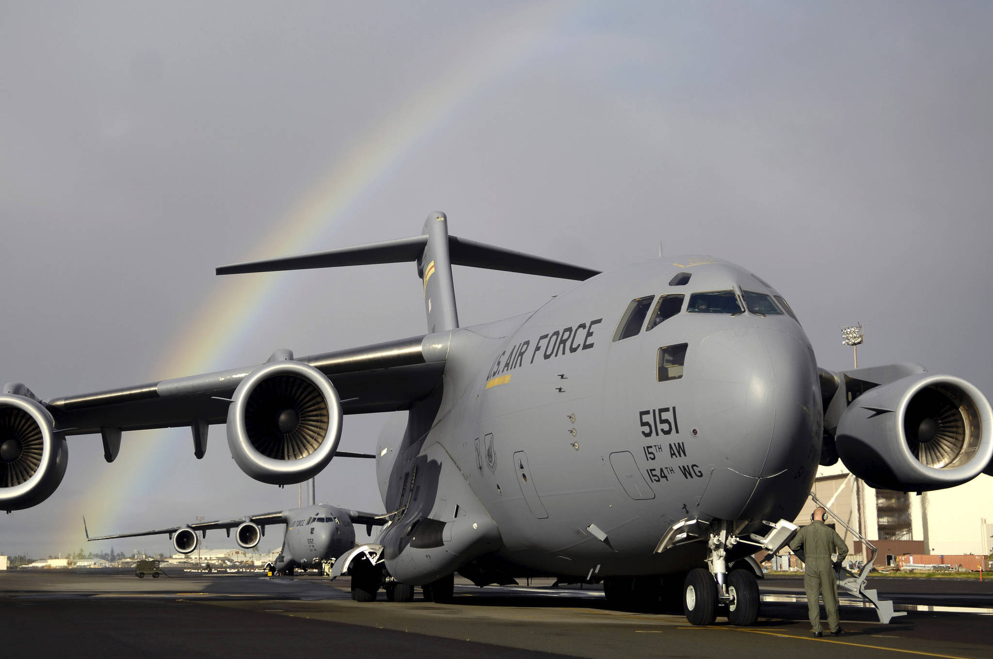 Staff Sgt. John Eller conducts pre-flights check on his C-17 Globemaster III Jan. 3 prior to taking off from Hickam Air Force Base, Hawaii for a local area training mission. Sgt. Eller is a loadmaster from the 535th Airlift Squadron. (U.S. Air Force photo/Tech. Sgt. Shane A. Cuomo)