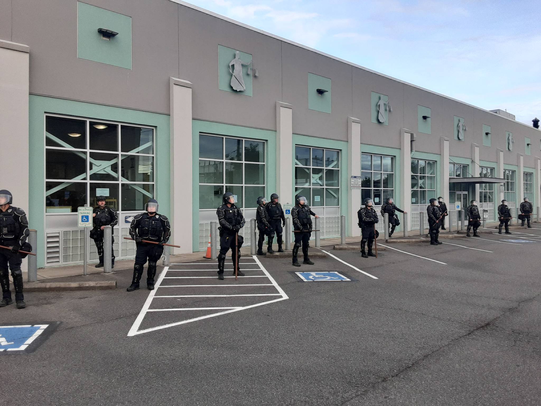 Auburn police in riot gear during a June 2, 2020, protest in the city’s downtown. Photo by Robert Whale/Auburn Reporter