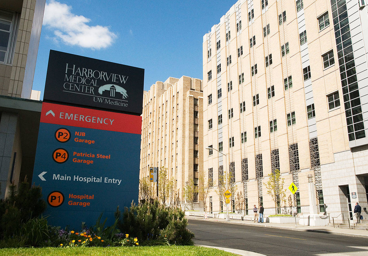 Exterior building and signage view from 9th Avenue of Harborview Medical Center in Seattle. COURTESY PHOTO, UW Medicine