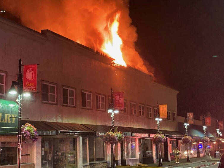 Flames burst out of the roof of Max House Apartments on July 24, 2021. Photo courtesy of the Valley Regional Fire Authority