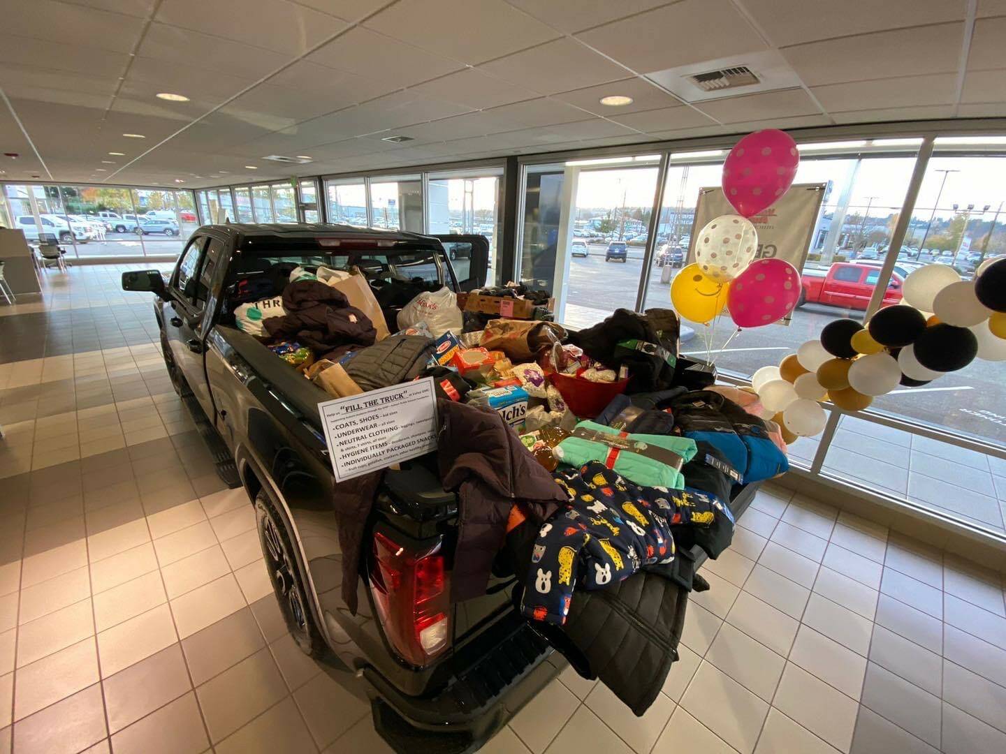 Photo of a truck at Valley Buick GMC full of goods donated to the Auburn Public Schools Foundation. Photo courtesy of Auburn Public Schools Foundation