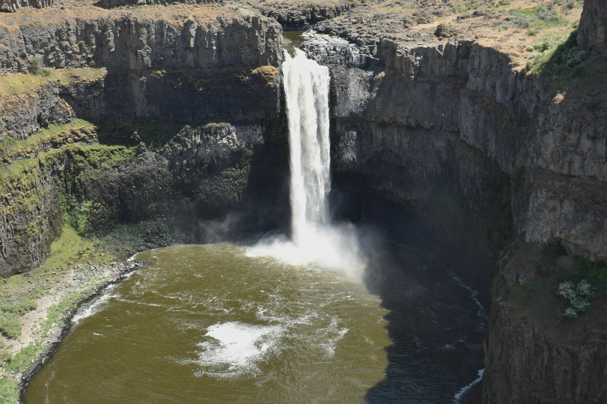 Just a short stroll away from the entry to the Palouse Falls State Park Heritage Site is the 200-foot falls that was created some 13,000 years ago. Signs on nearby trails are deadly serious, warning that people have perished after not following the rules. Covering all their bases, park officials even warn against harassing the resident rattlesnakes. Photo by Kevin Hanson