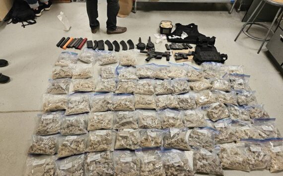 Police found a firearm and firearms parts, ammunition, body armor, more than 134 pounds of MDMA, more than 2,300 fentanyl pills, and more in a 33-year-old Auburn man’s apartment while executing a search warrant. (Courtesy of the U.S. Department of Justice)