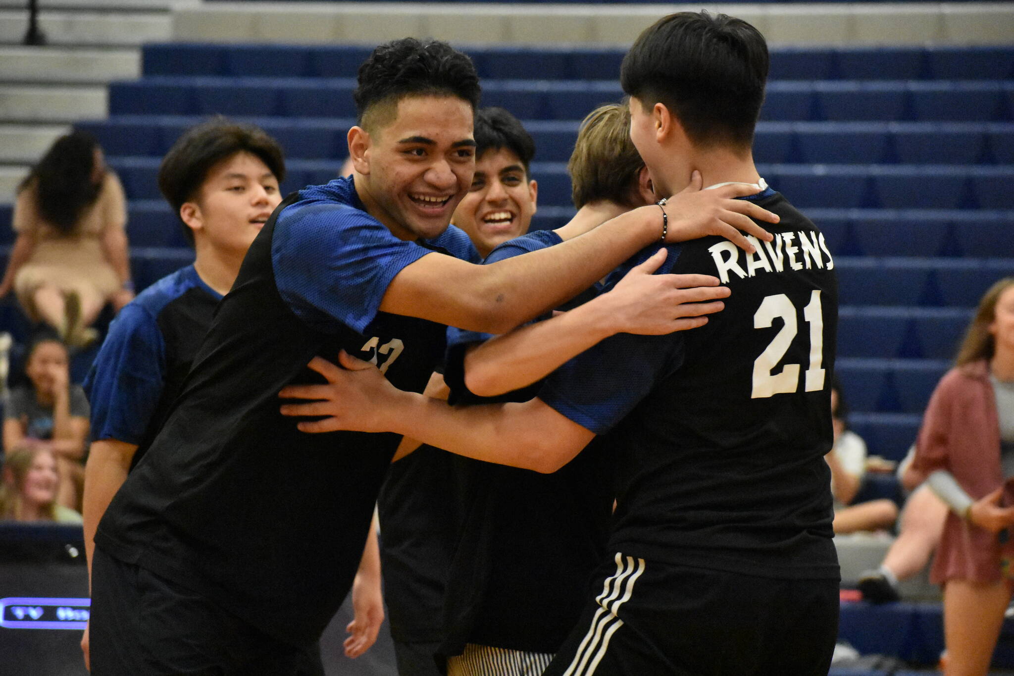 Ben Ray / The Reporter
A pod of Ravens gives some smiles during senior night.