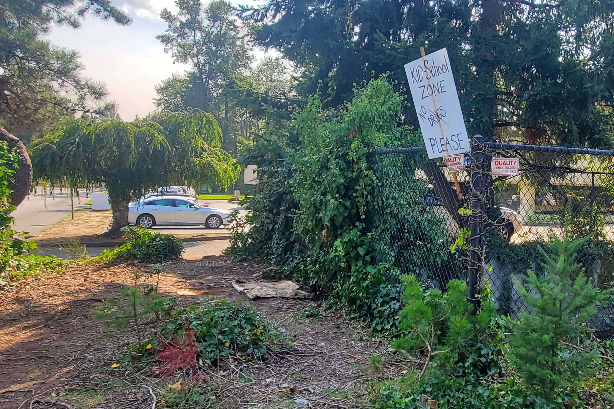 The corner outside the Day Center, 33505 13th Pl. S., as seen in 2023, where a woman had lived in a shelter made from umbrellas. File photo