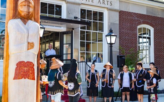 Photo courtesy of City of Auburn
The Muckleshoot Indian Tribe unveil their gift of a Welcome Figure and provide a song and blessing during the Postmark Center for the Arts grand opening. The figure was created by Muckleshoot artists Sam Obrovac, Tyson Simmons and Keith Stevenson.