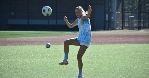 Auburn Riverside’s Caitlin Riggs controls the ball during practice. Ben Ray / The Reporter