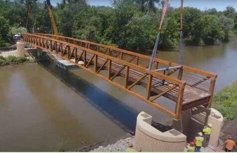 The city of Auburn cuts the ribbon on the new pedestrian bridge at Game Farm and Game Farm Wilderness Park on Oct. 1. Photo courtesy city of Auburn