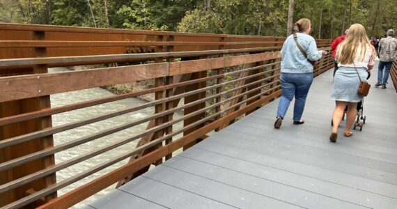 Pedestrians try out the new bridge Oct. 1 at Game Farm Park. Photos by Andy Hobbs/Auburn Reporter