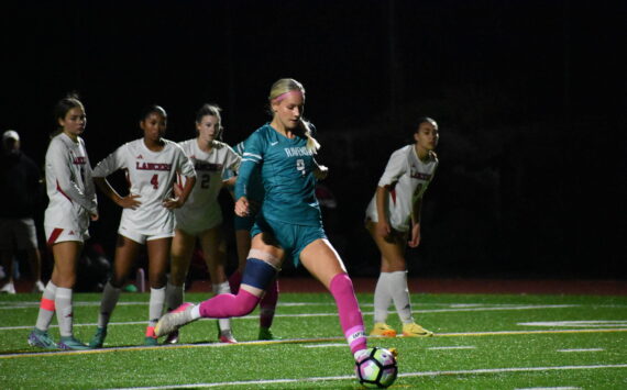 Caitlyn Riggs takes a penalty shot against Kennedy Catholic, a shot which gave the Ravens the lead. Ben Ray / The Reporter