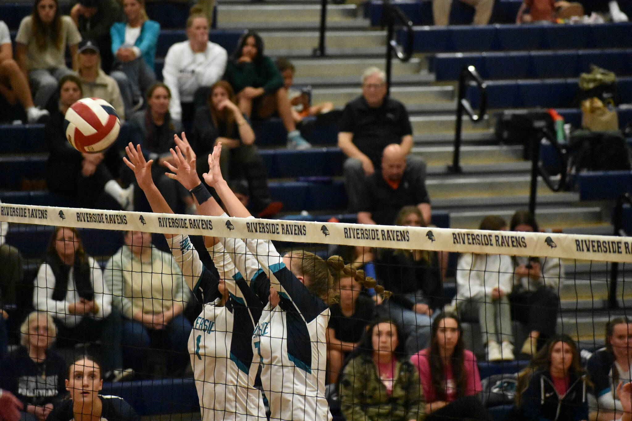 Peyton Cantrell and Bryanna Dodson go up for a block against Kennedy Catholic. Ben Ray / The Reporter