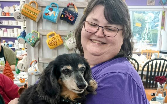 Owner JoAnn Johnson and the star of Klay Crazy — Ringo Starr the Dachshund. Photo by Bailey Jo Josie/Sound Publishing.