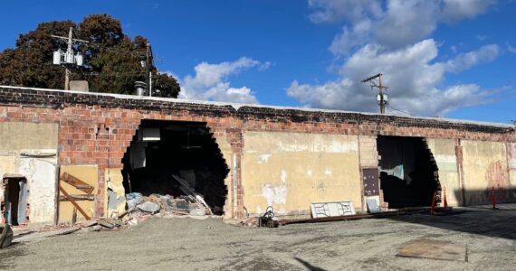 Photo of holes in south facing wall of the Auburn Avenue Theater on Oct. 16 as demolition got underway. Courtesy photo