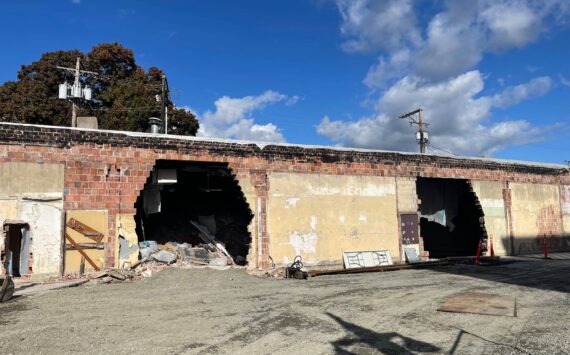 Photo of holes in south facing wall of the Auburn Avenue Theater on Oct. 16 as demolition got underway. Courtesy photo