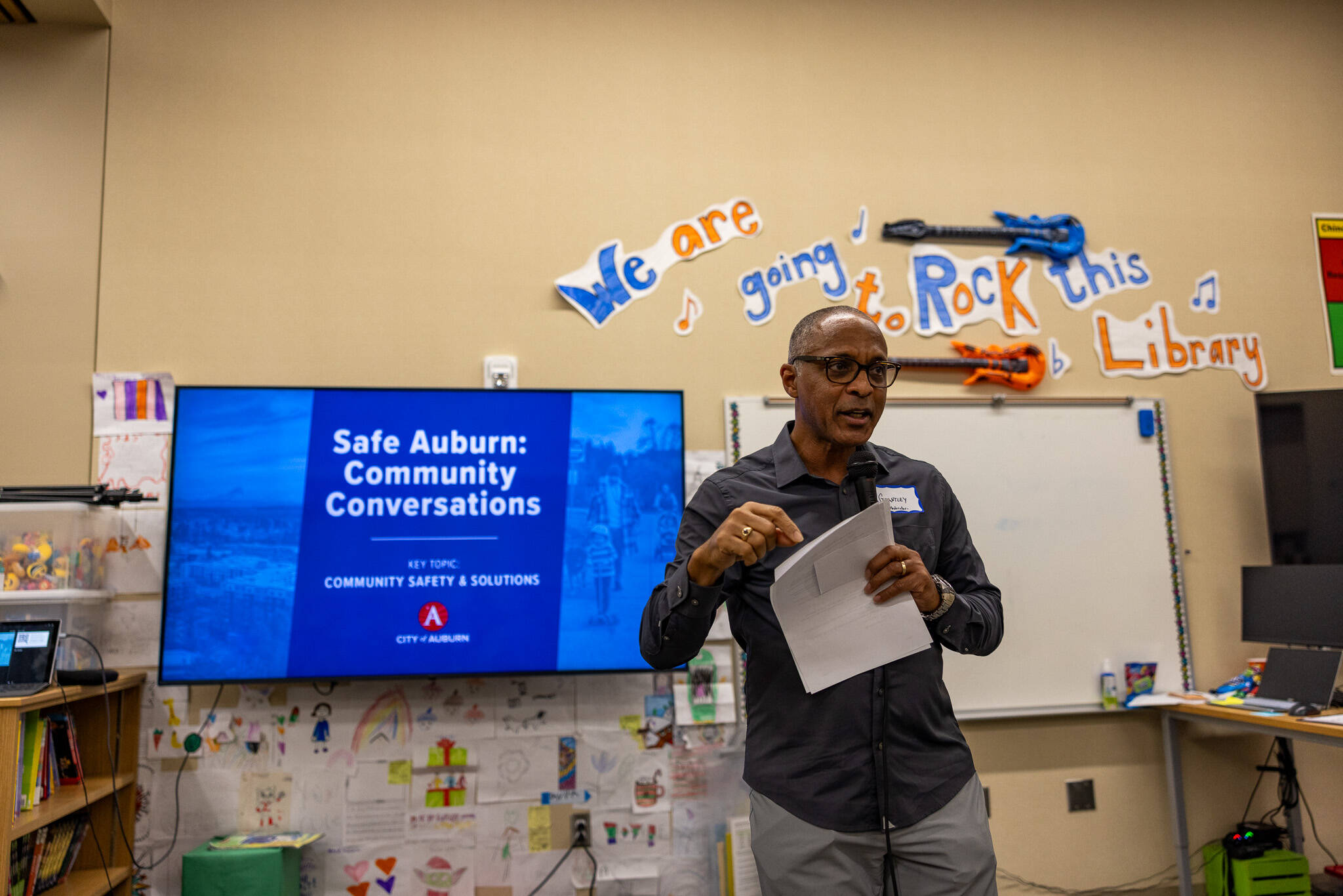 Master of ceremonies Waylon Menzia leads off the public safety meeting at Chinook Elementary. Photo courtesy of City of Auburn